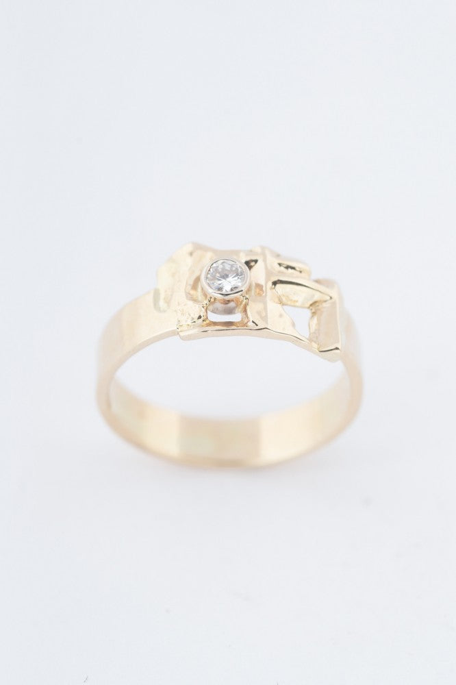 Gold ring with a brilliant cut diamond with Master Mark P. vd Hout