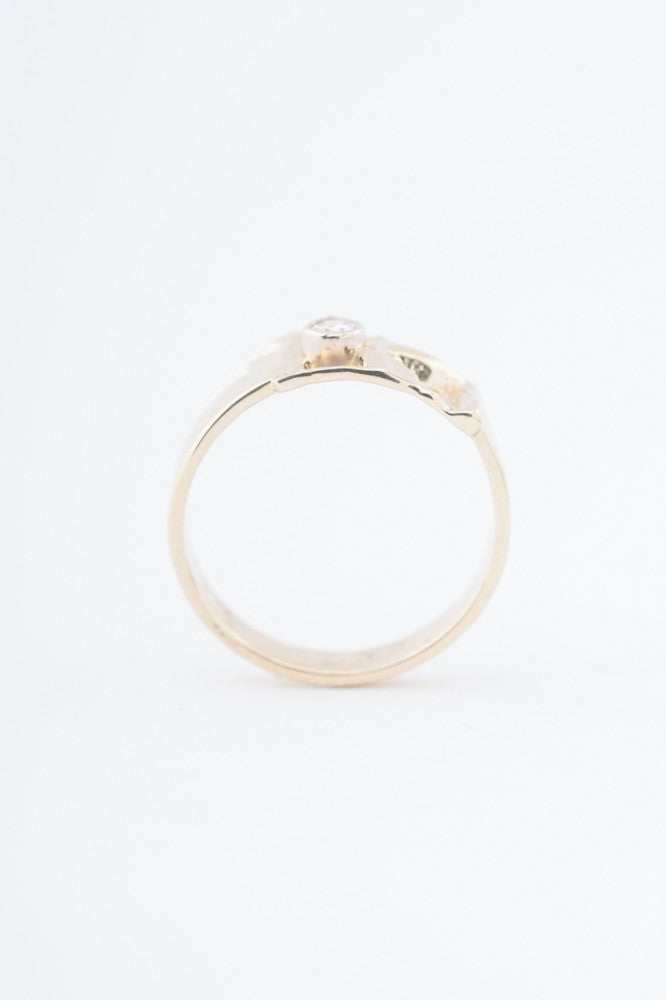 Gold ring with a brilliant cut diamond with Master Mark P. vd Hout