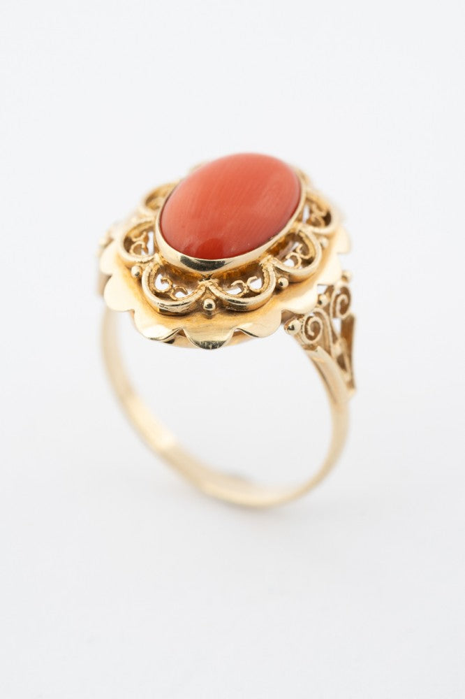 Gold ring with blood coral