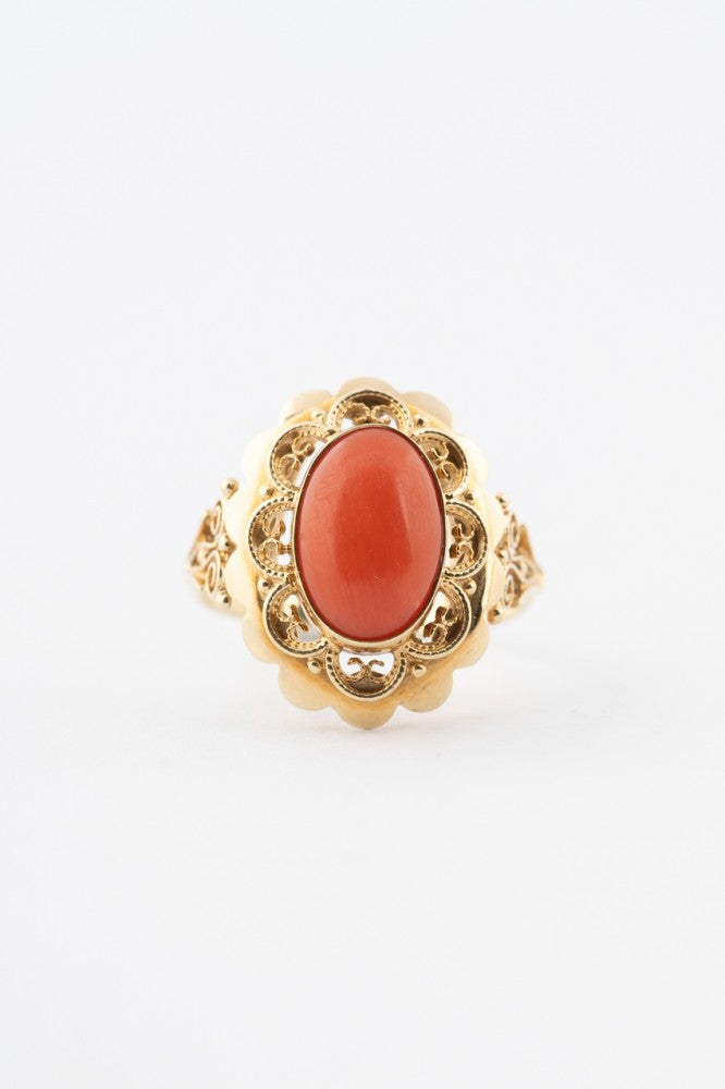 Gold ring with blood coral