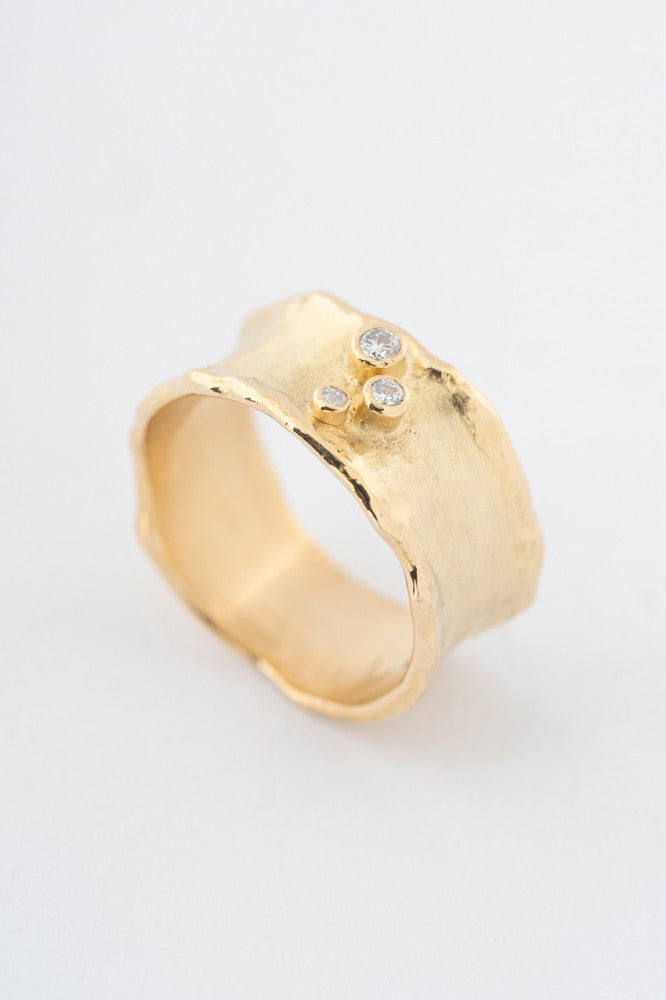 Gouden band ring met 3 briljanten