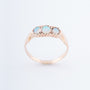 Gold row ring with 3 opals
