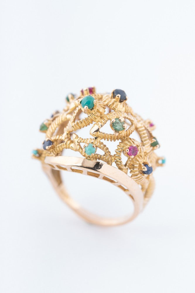 Gouden ring met diverse edelstenen