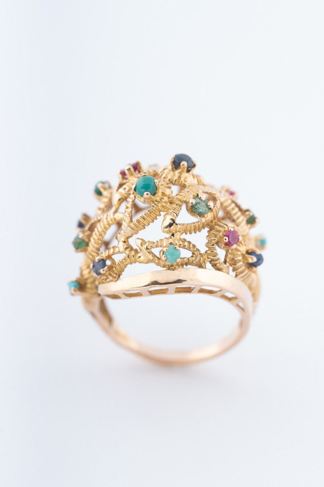 Gouden ring met diverse edelstenen