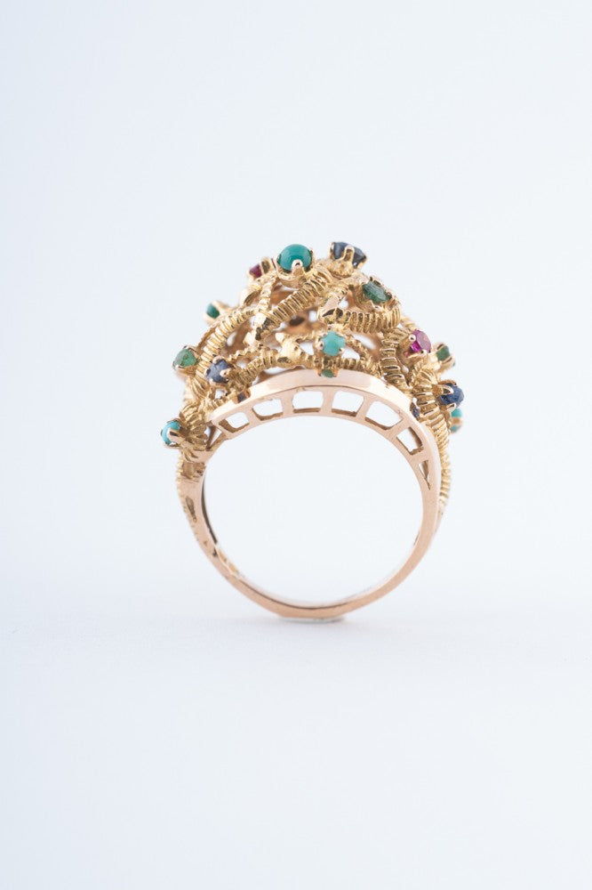 Gouden ring met diverse edelstenen