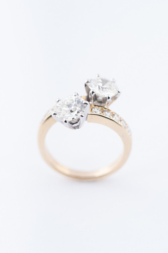 Gold ring "moi et toi" with diamonds