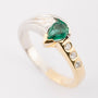 White/yellow gold ring with emerald