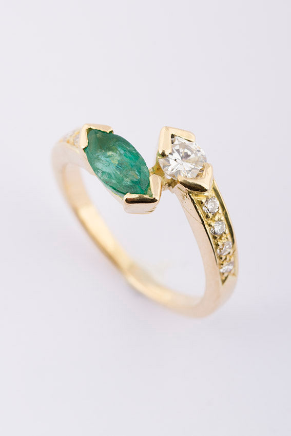 Slag ring met smaragd en briljant