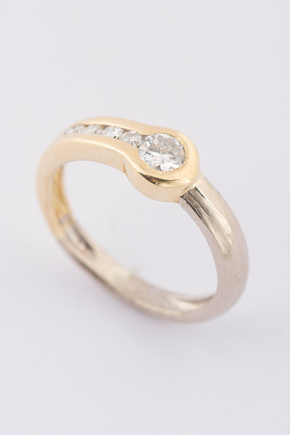 Wit/geel gouden ring met briljant