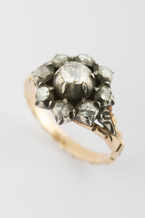Entourage ring with rose-cut diamond