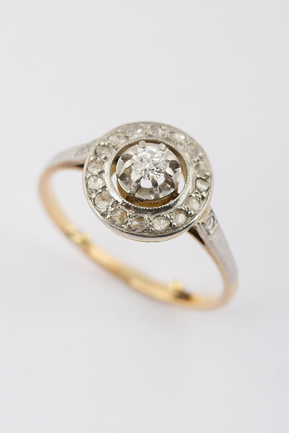Gold entourage ring with old-cut brilliant and diamond