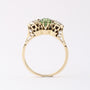 Antique gold row ring with peridot and rose diamond