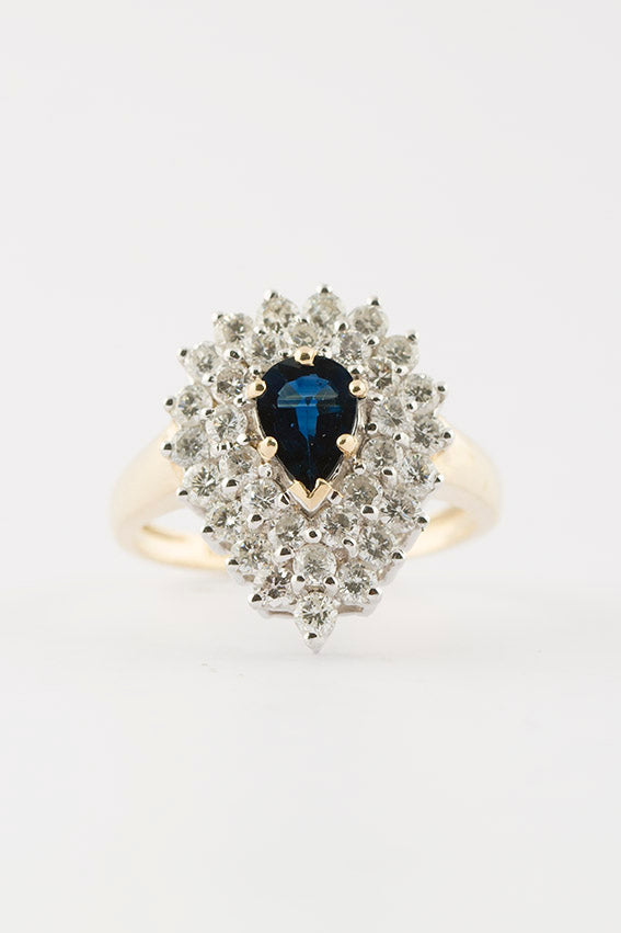 Wit/geel gouden dubbele entourage ring met saffier en briljant