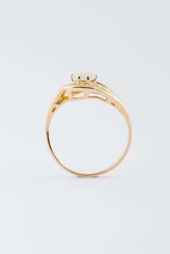 Gold ring with opal and diamond