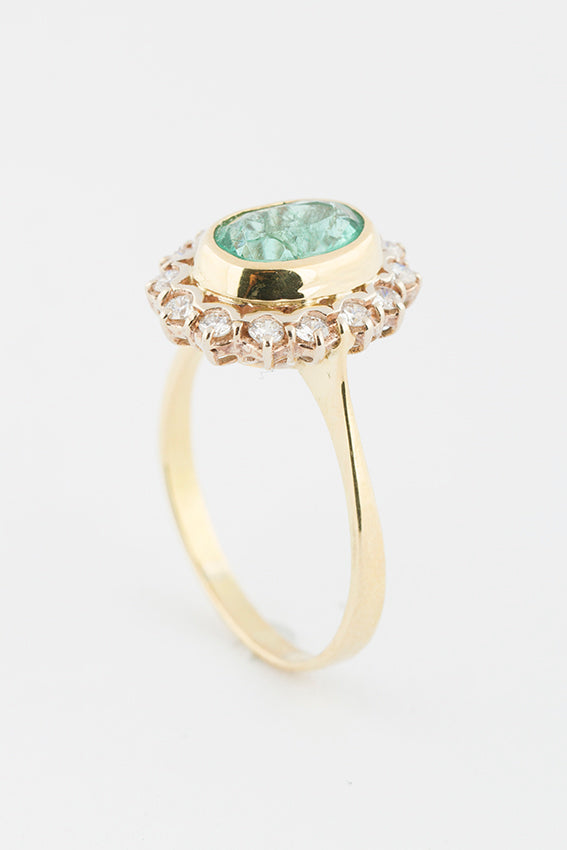 Entourage ring met smaragd en briljant
