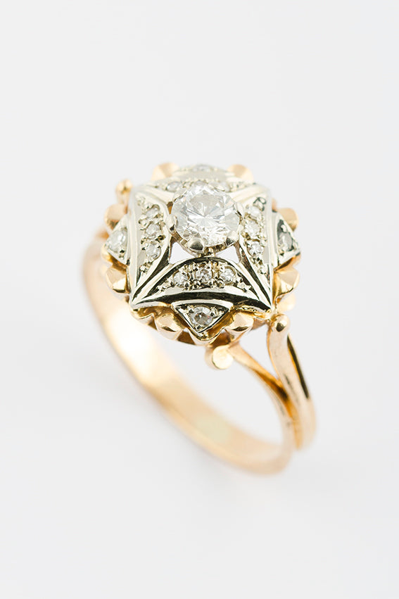 Gouden entourage ring met briljant en diamant