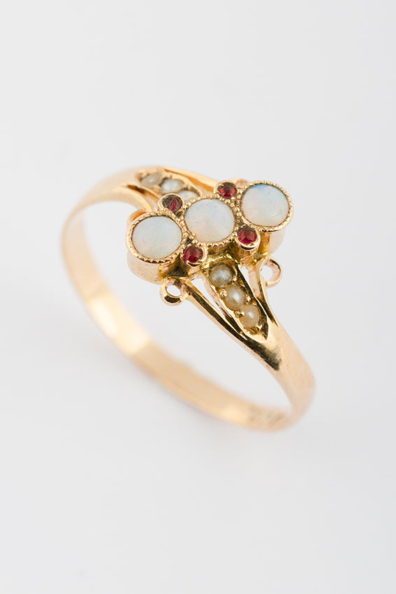 Antique ring with opal, ruby ​​and pearls