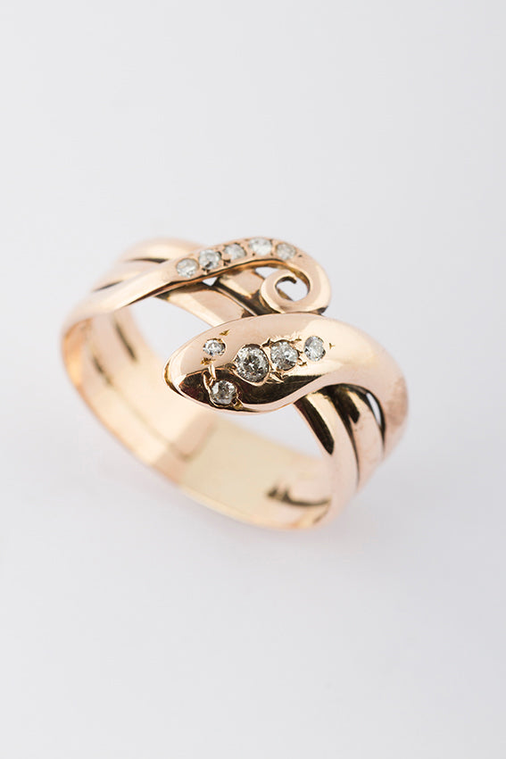 Gouden slangen ring met briljant