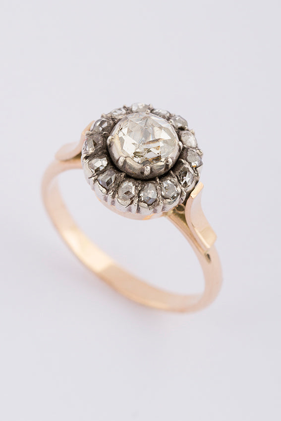 Antique gold entourage ring with rose-cut diamond