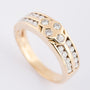 Gold band ring with brilliant