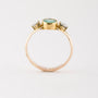 Gold ring with emerald and 2 diamonds