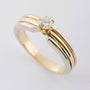 gouden tri-color solitair ring met een briljant