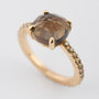 Gold ring with smokey topaz and brilliant