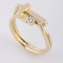 Gold stylized ring with brilliant