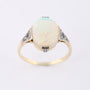 Crystal opal in gold ring