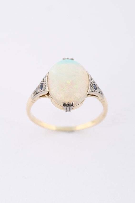Crystal opal in gold ring