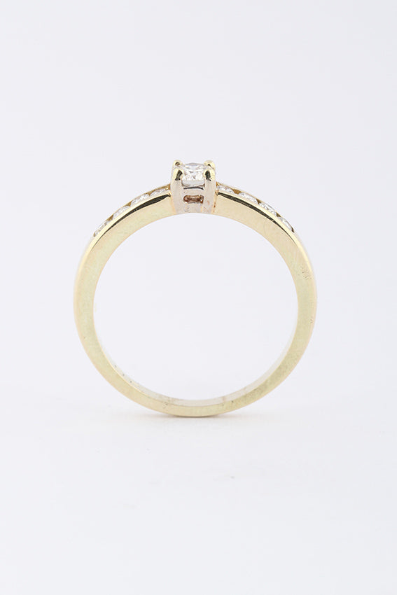 Gouden rij ring met 9 briljanten