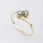 Gouden slag ring met roos diamanten