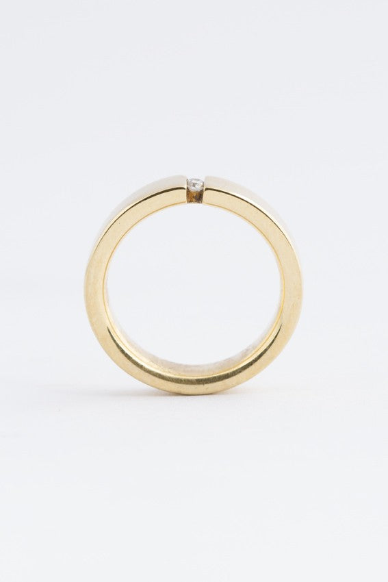 Gouden massieve ring met briljant