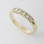 Gold row ring with 5 diamonds