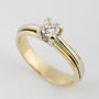 Wit/geel gouden solitair ring met briljant 0.61 ct.