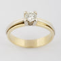 Wit/geel gouden solitair ring met briljant 0.61 ct.