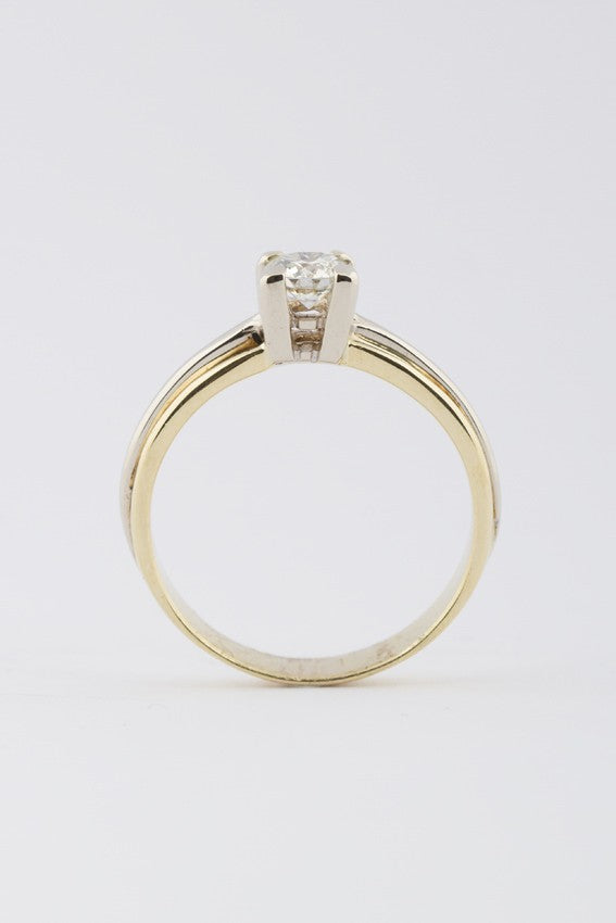 Wit/geel gouden solitair ring met briljant 0.61 ct.