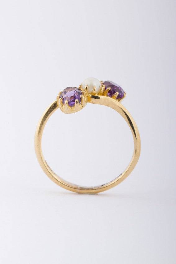 Gouden slag ring met parel en amethist