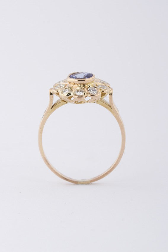 Gouden entourage ring met tanzaniet en briljanten