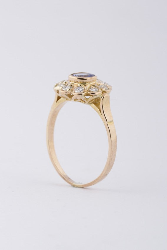 Gouden entourage ring met tanzaniet en briljanten