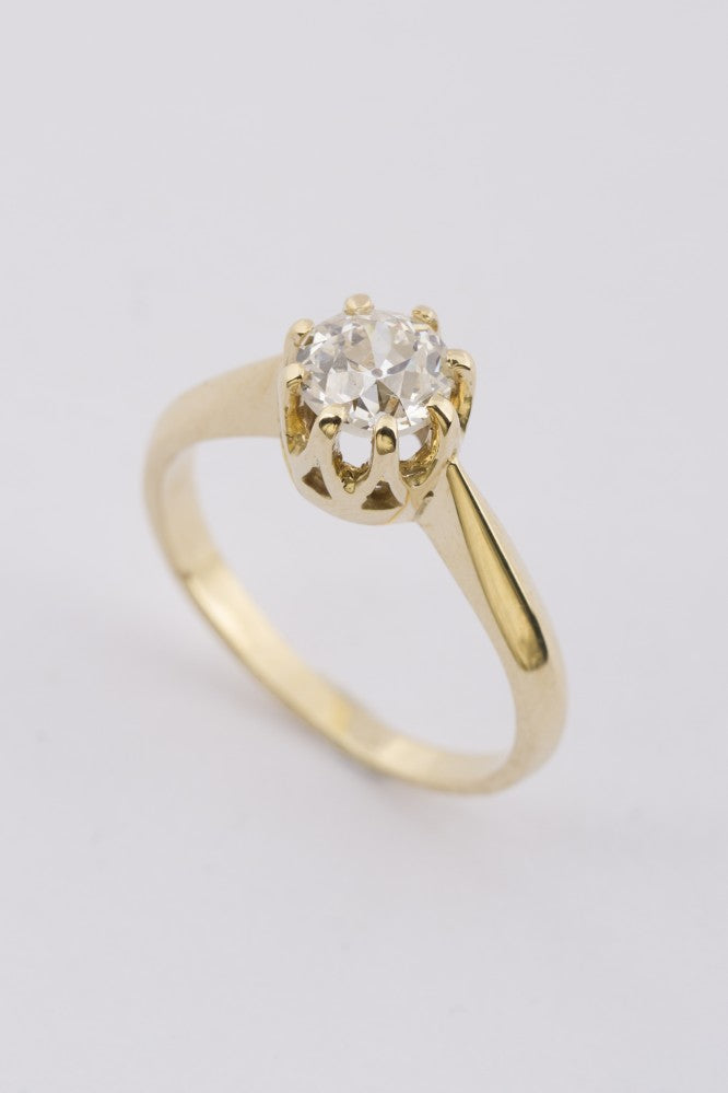 Gouden solitair ring met oud geslepen briljant