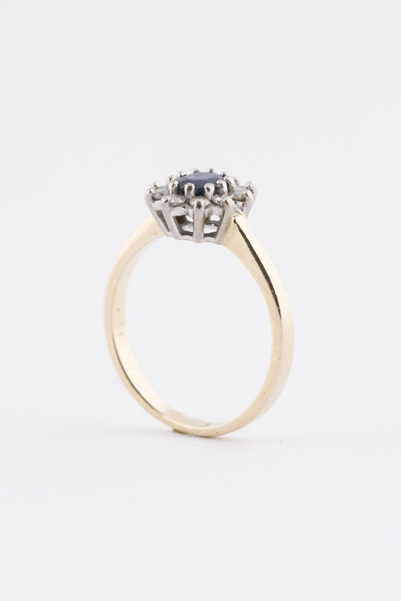 Gouden entourage ring met saffier en briljanten