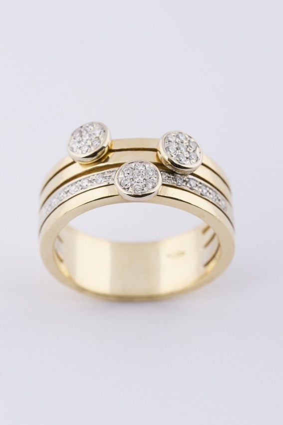 Brede gouden ring met briljanten