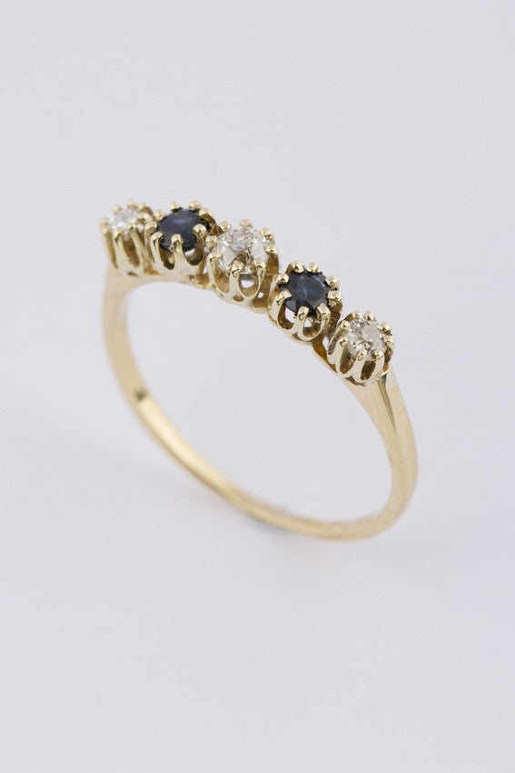 Gouden rij ring met saffier en briljanten
