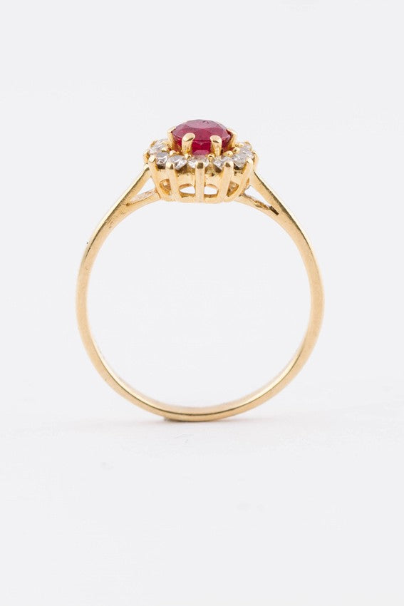 Gouden entourage ring met robijn en briljanten