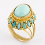 Gouden entourage ring met turkoois