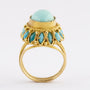 Gouden entourage ring met turkoois