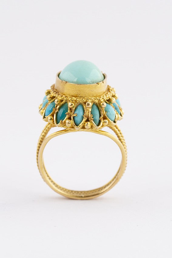 Gouden entourage ring met turkoois