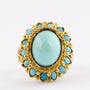Gouden entourage ring met turkoois