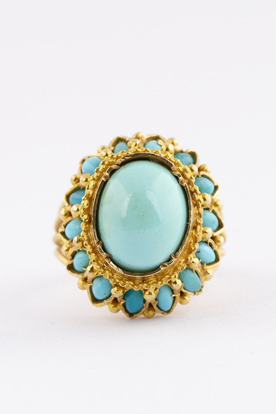 Gouden entourage ring met turkoois